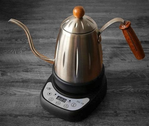 Gooseneck kettle sitting atop of a single stove, heating the water. 