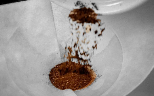 Adding coffee grounds to the Chemex