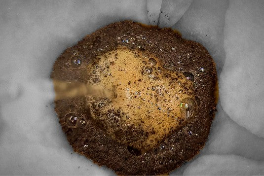 Pouring water into the Chemex in a spiral